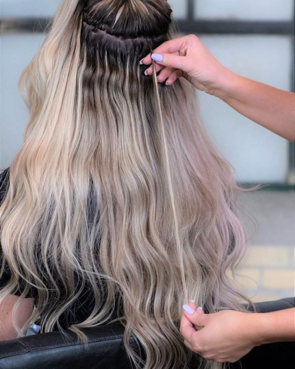 Luxury hair extension services for longer, fuller hair in East Auckland