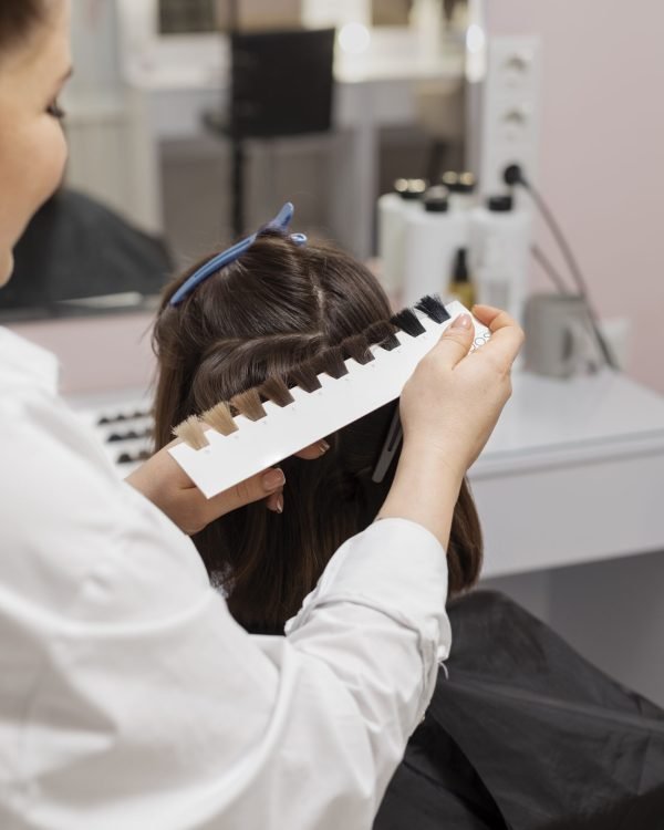 woman-getting-treatment-hairdresser-shop (1)